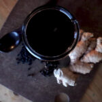 elderberry syrup ginger cloves wooden cutting board weck jar canning jar