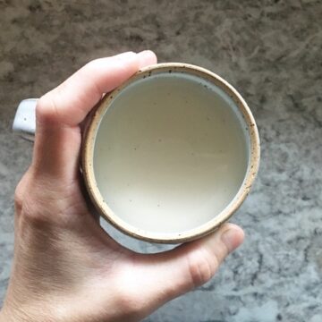 Mug of tea made with homemade chai syrup.