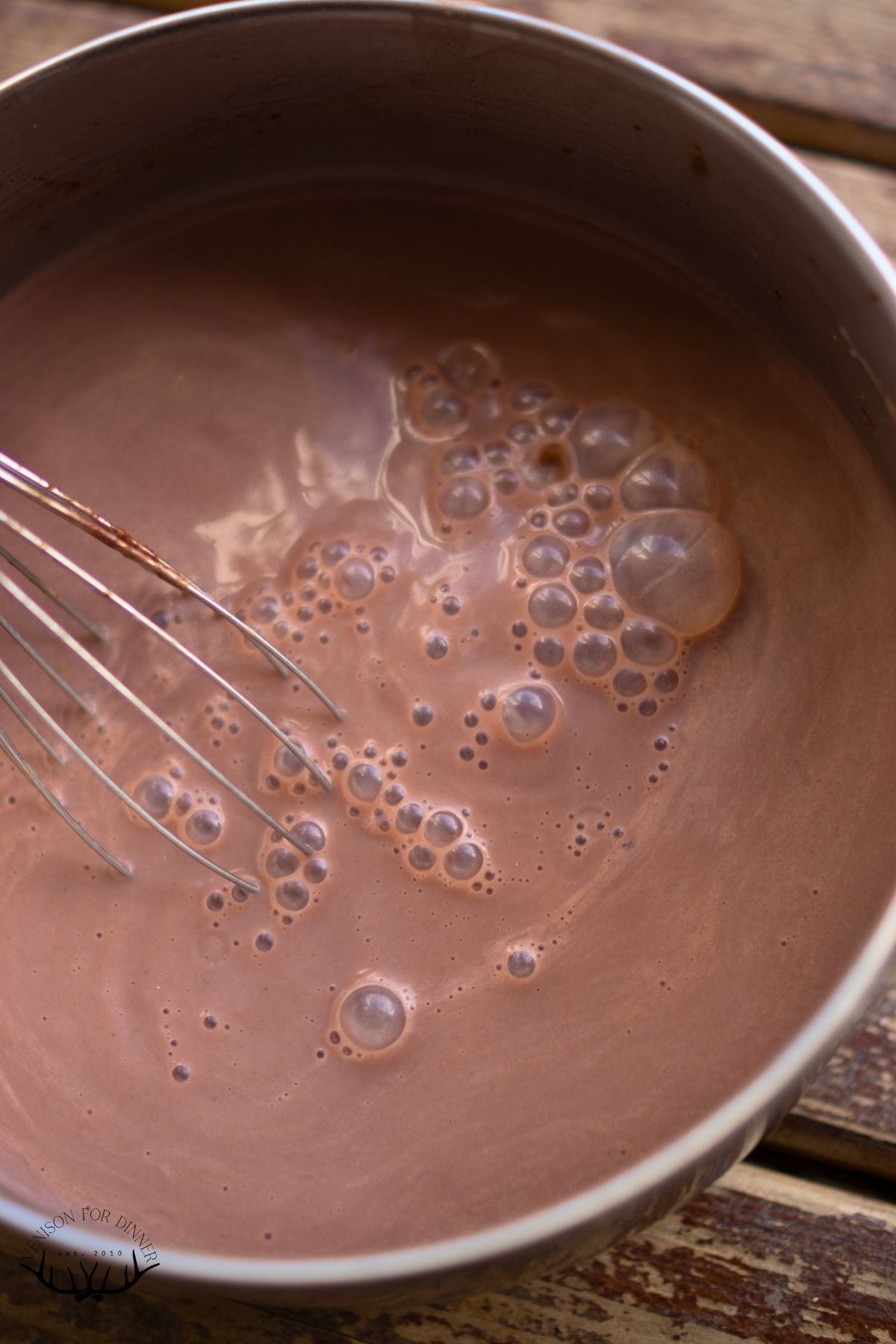 Whisk in a pot of hot cocoa.