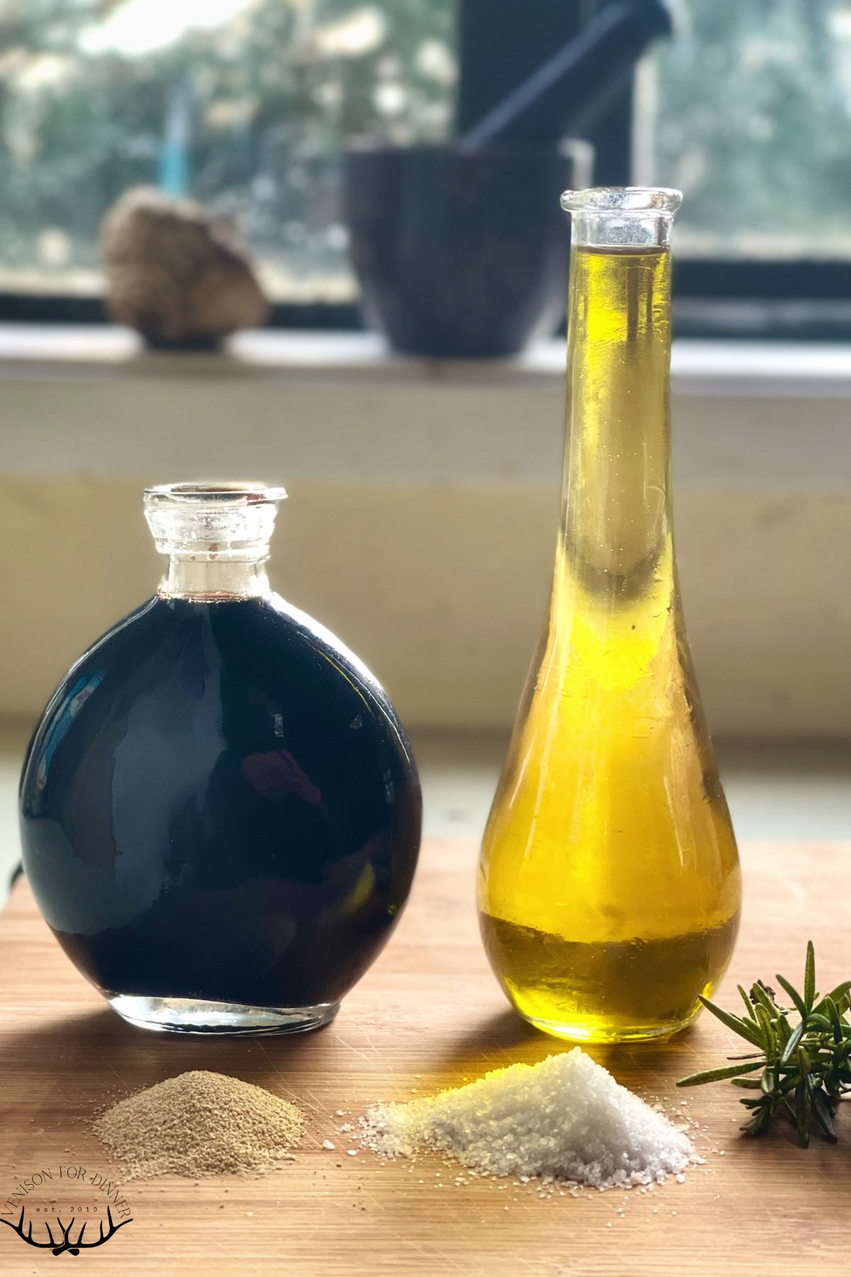 Bottles of oil and balsamic vinegar.