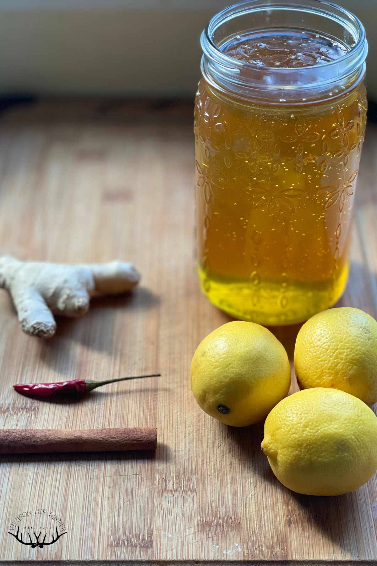 Ingredients to make fermented lemons on a wooden board.