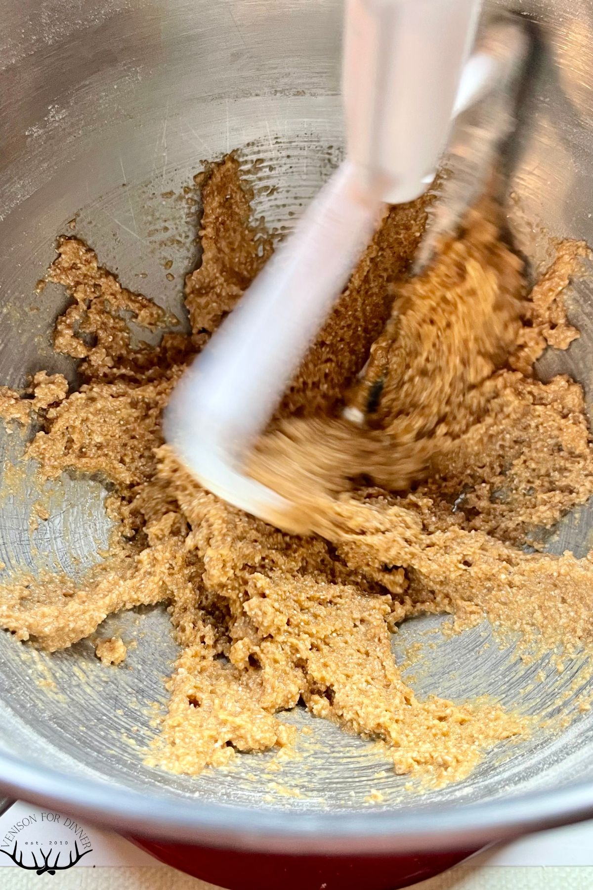 Egg noodle dough in a mixer.