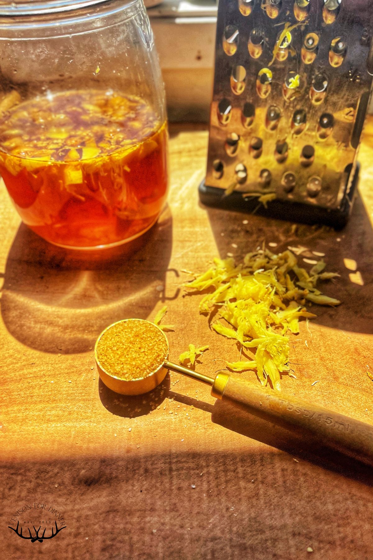 Grated ginger on a board.