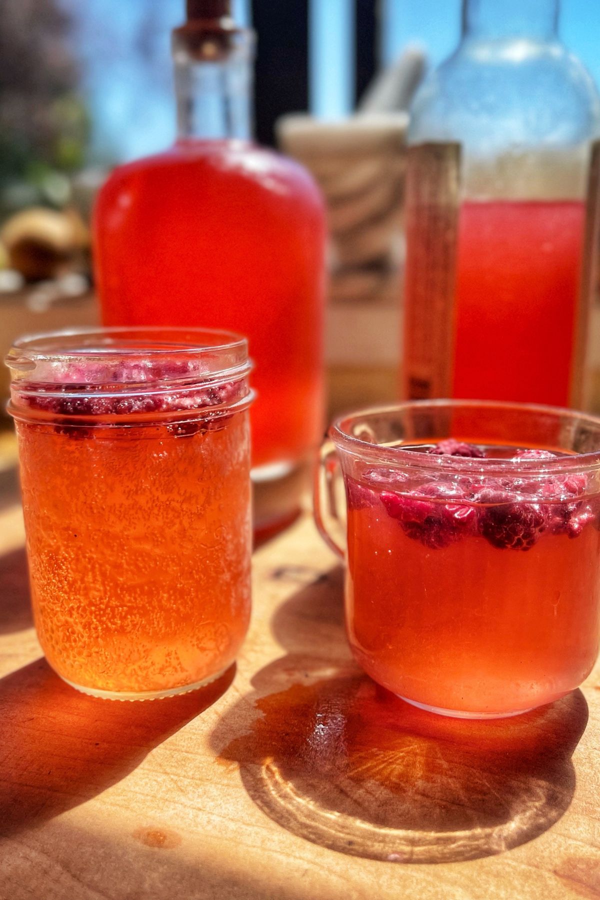Glasses of homemade raspberry soda.