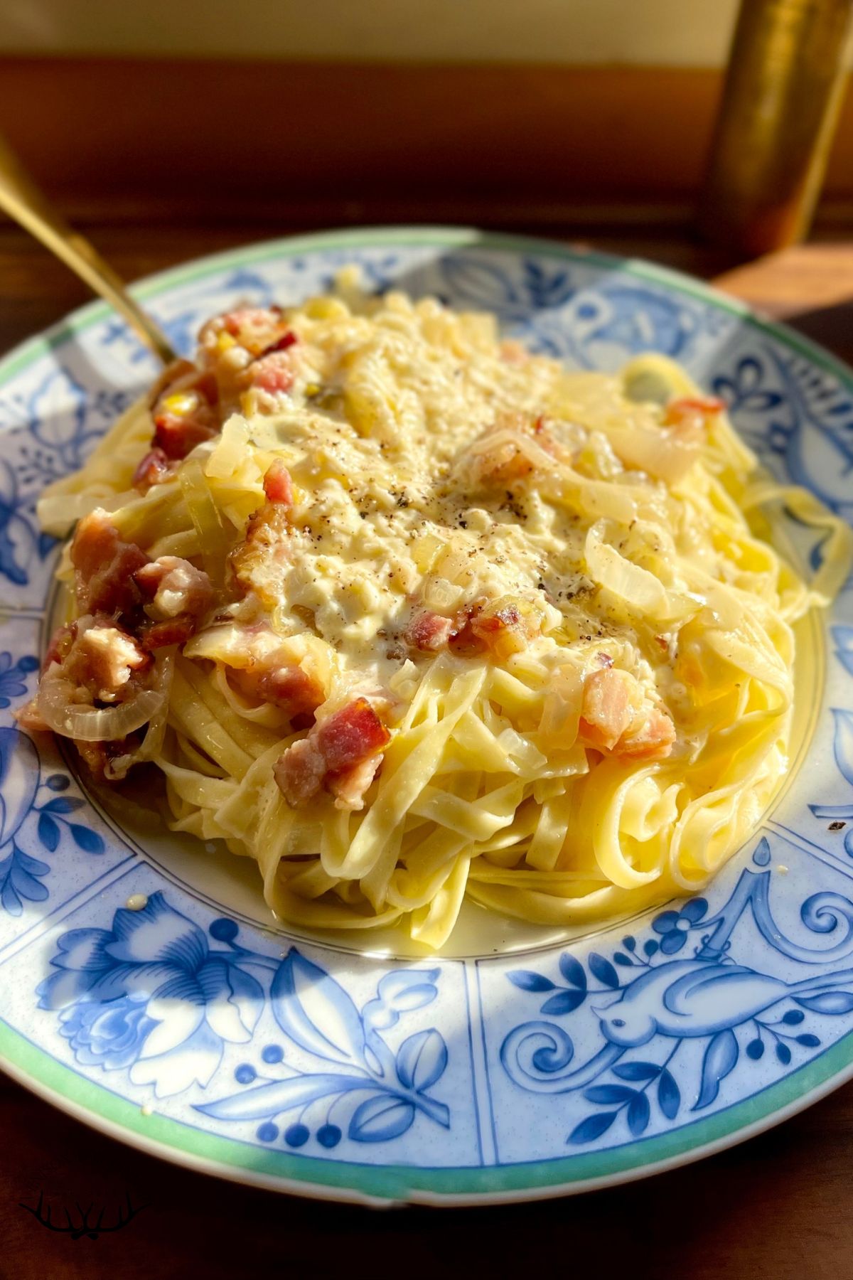 Large bowl of homemade fettuccine carbonara.