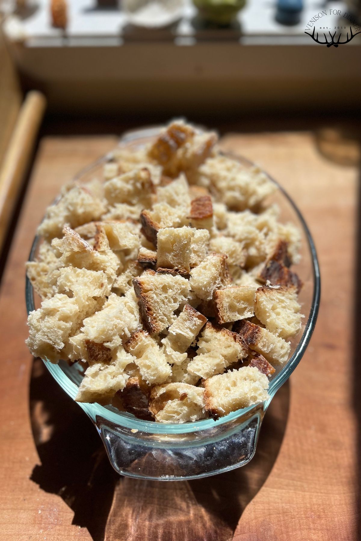 Sourdough bread cubes in a mixing bowl.