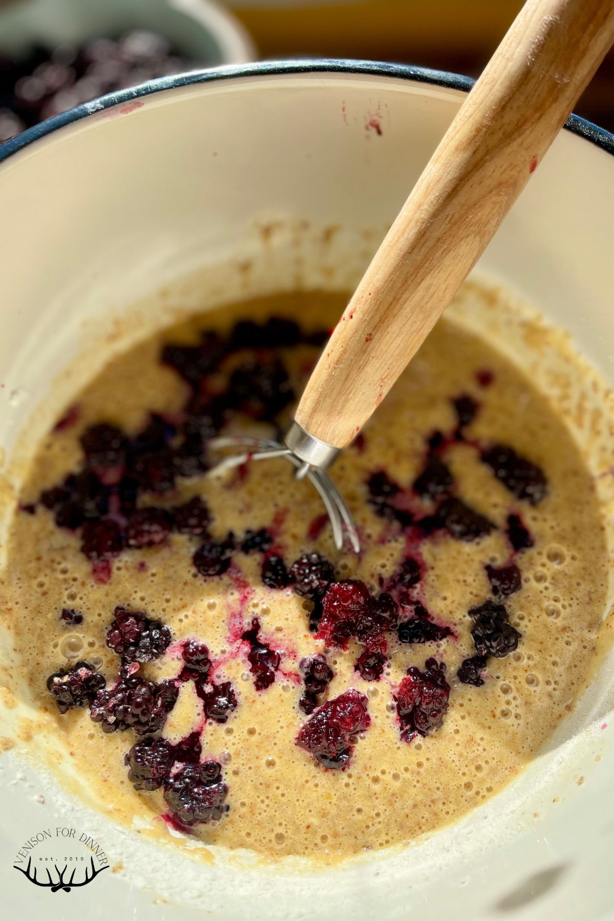 Blackberries stirred into muffin batter.