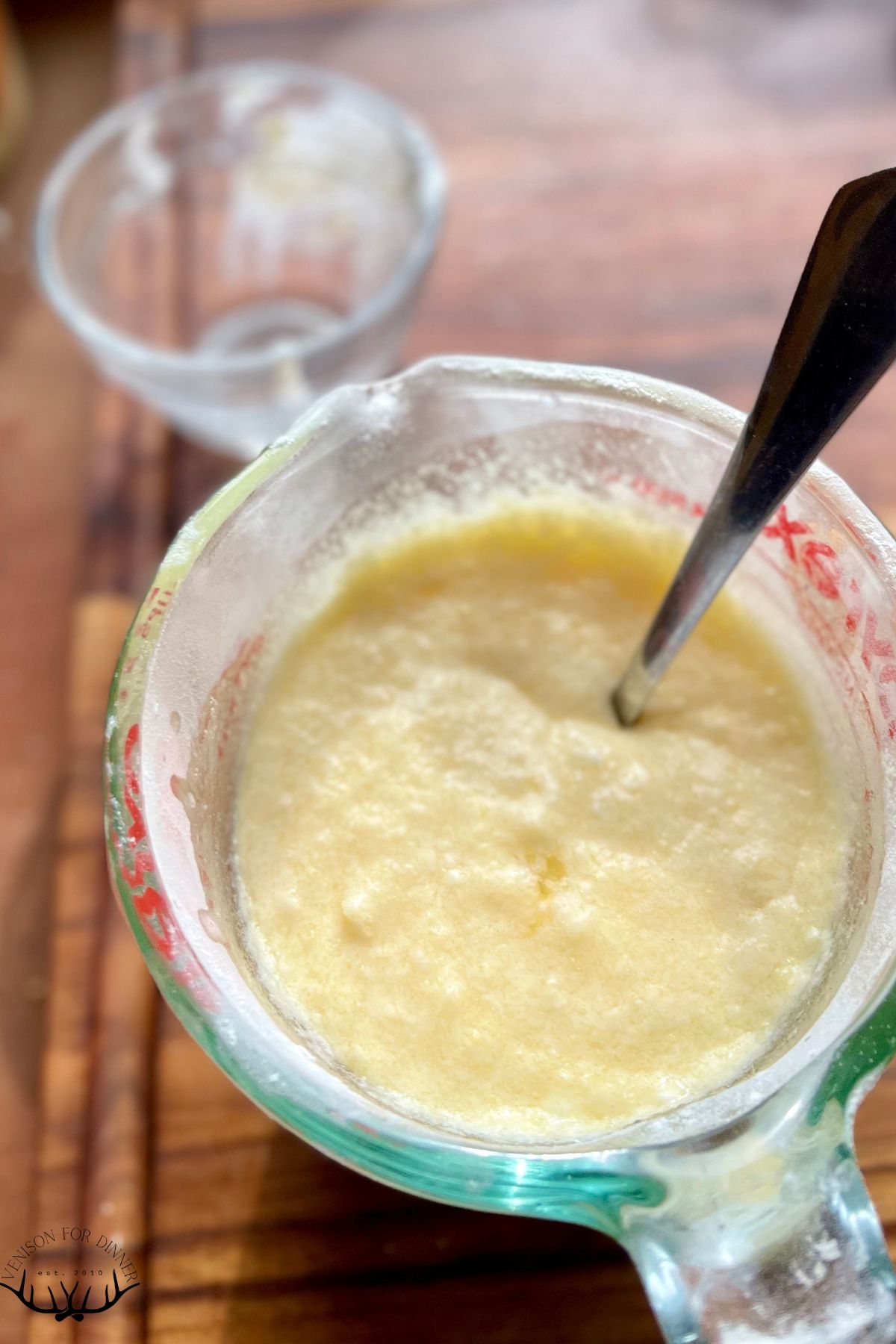 Wet ingredients in a bowl for muffins.