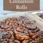 Two baking pans of healthy cinnamon rolls.
