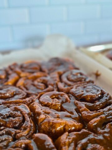Two pans of healthy cinnamon sticky buns.