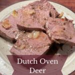 Slices of deer roast with garlic au jus.