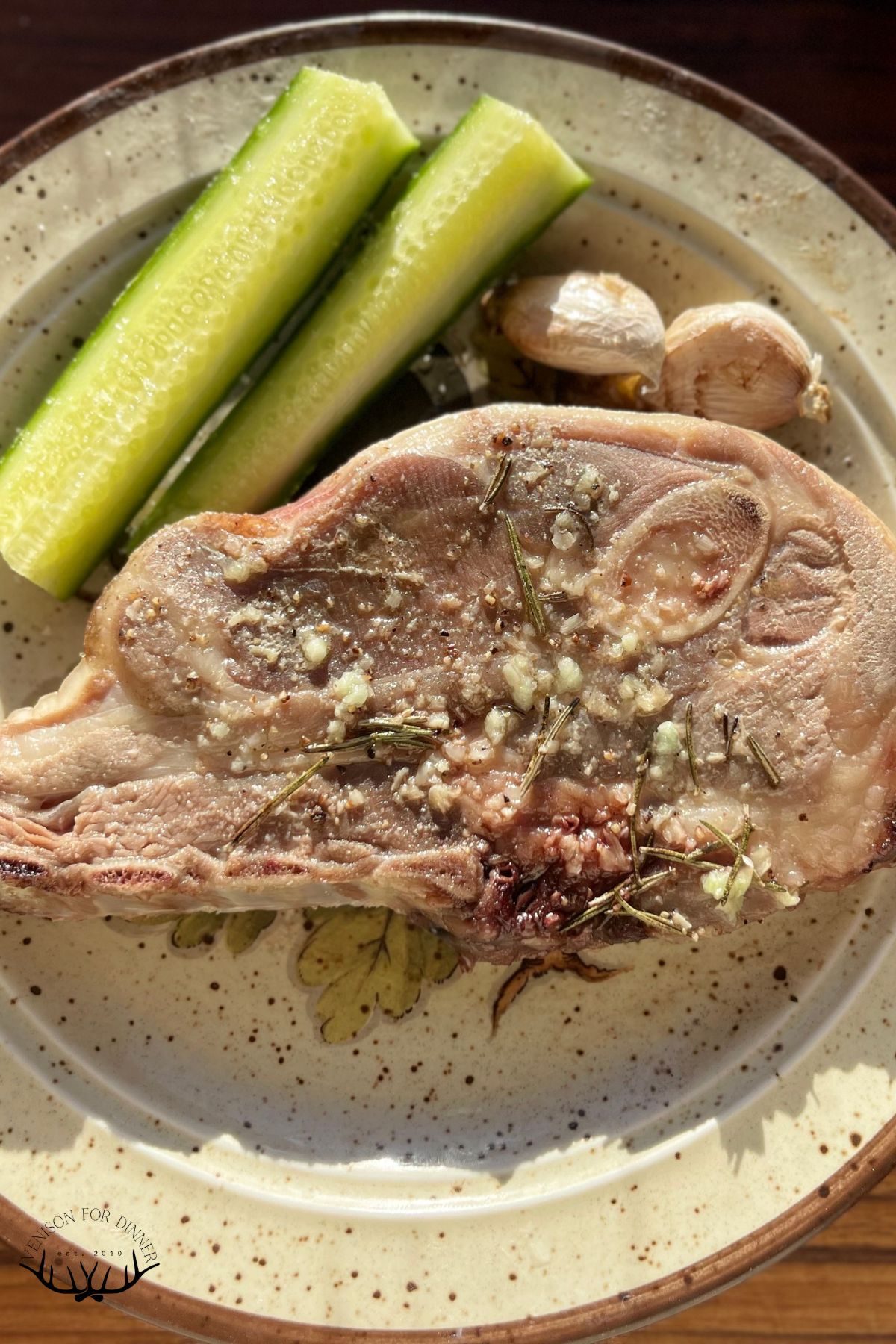 Lamb chops roasted in a Dutch oven, plated.