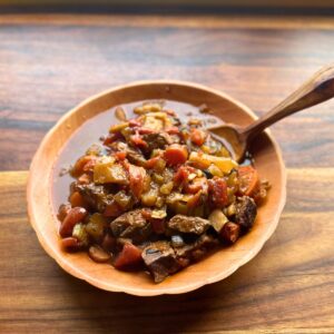 Single bowl full of venison stew with veggies.