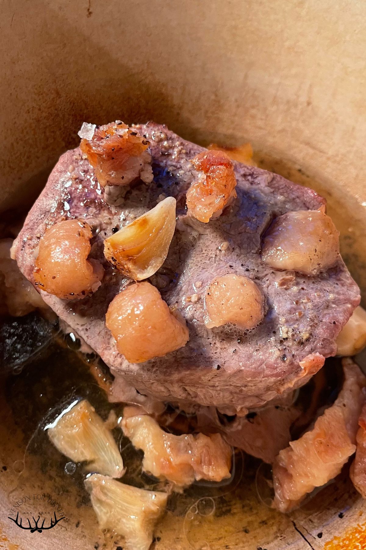 Roasted garlic in a deer roast.