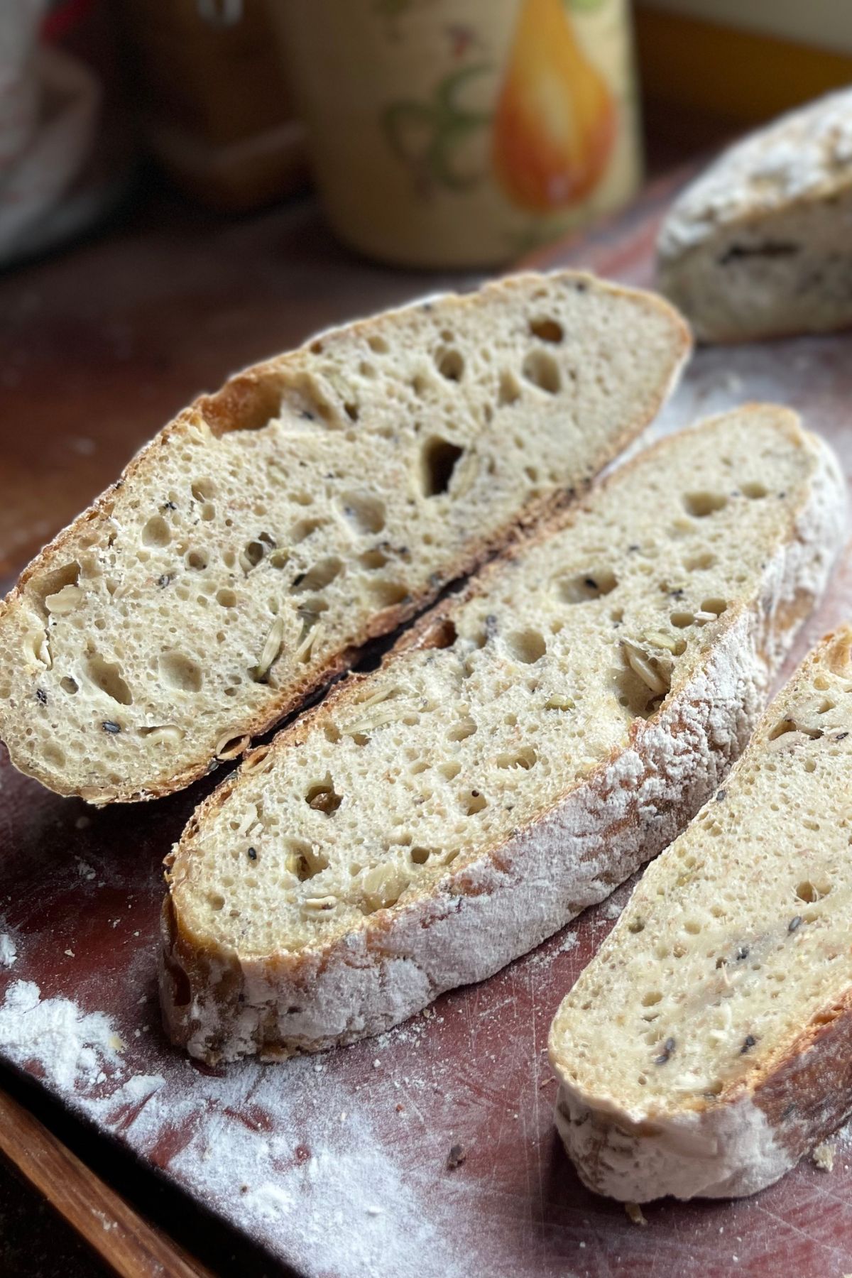 Slices of seedy sourdough bread.