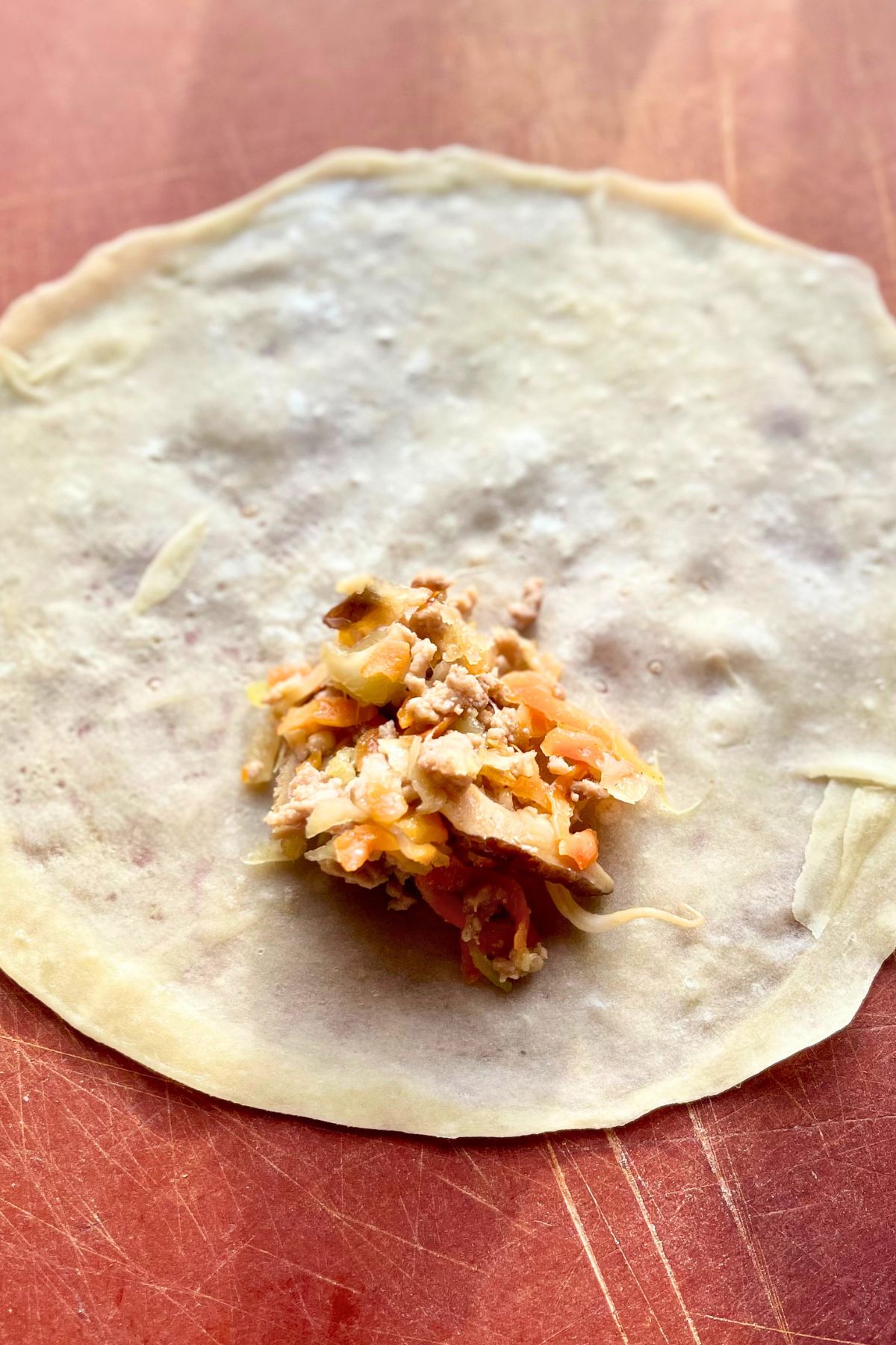 Filling on a spring roll wrapper.