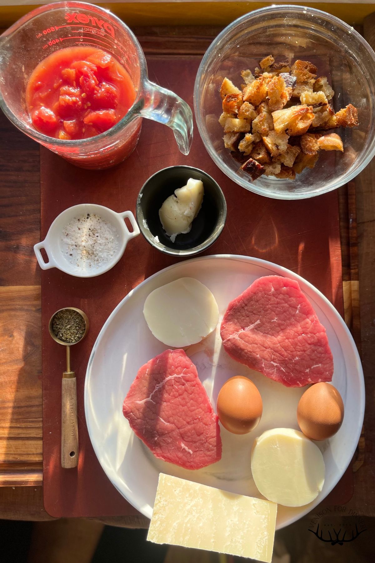 Ingredients to make venison parmesan.