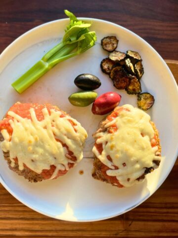 Two servings of venison (veal) parmesan).