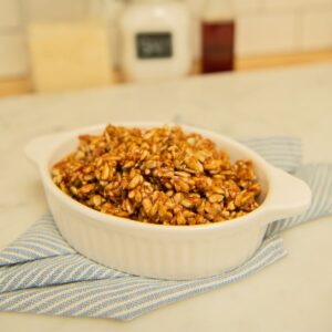 Baking dish filled with candied sunflower seeds.