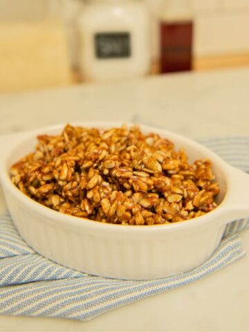 Baking dish filled with candied sunflower seeds.