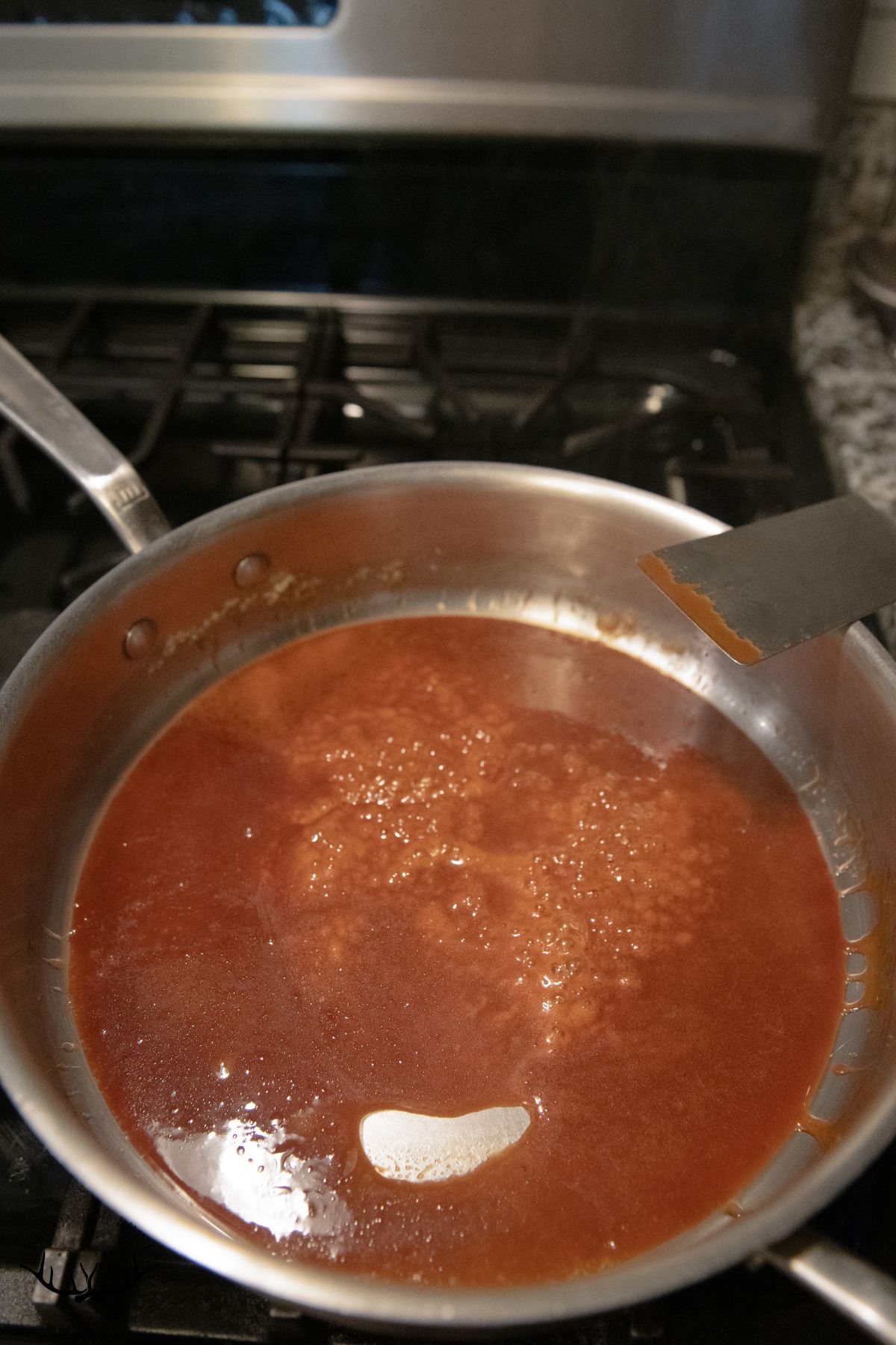 Finished caramel in a saucepan.