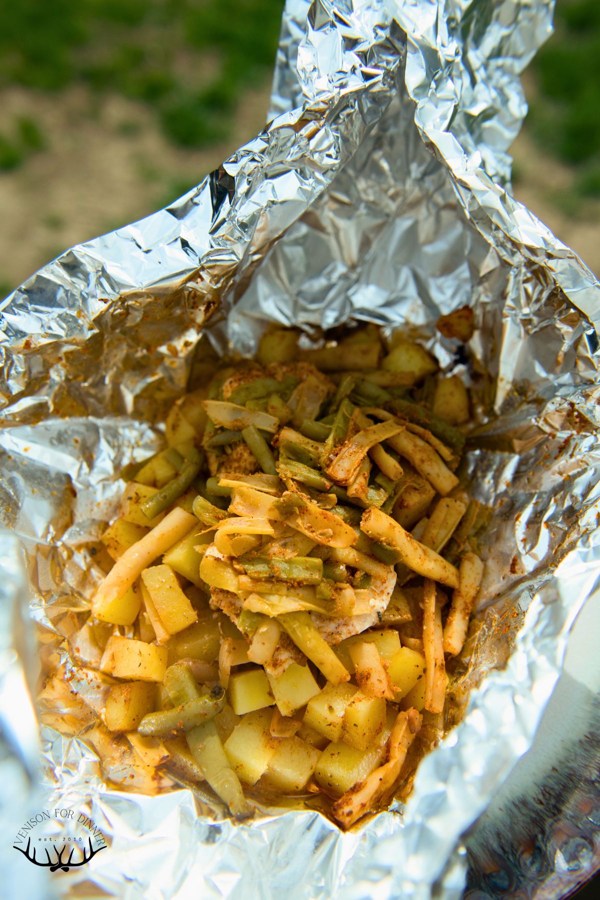 Full cooked chicken foil packets to serve.