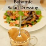 Homemade thick balsamic dressing in a glass carafe.
