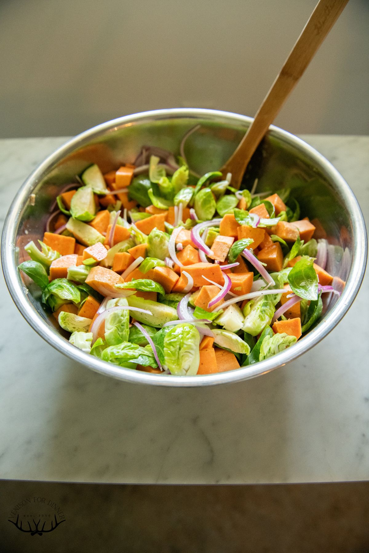 Mixing bowl of chopped veggies.