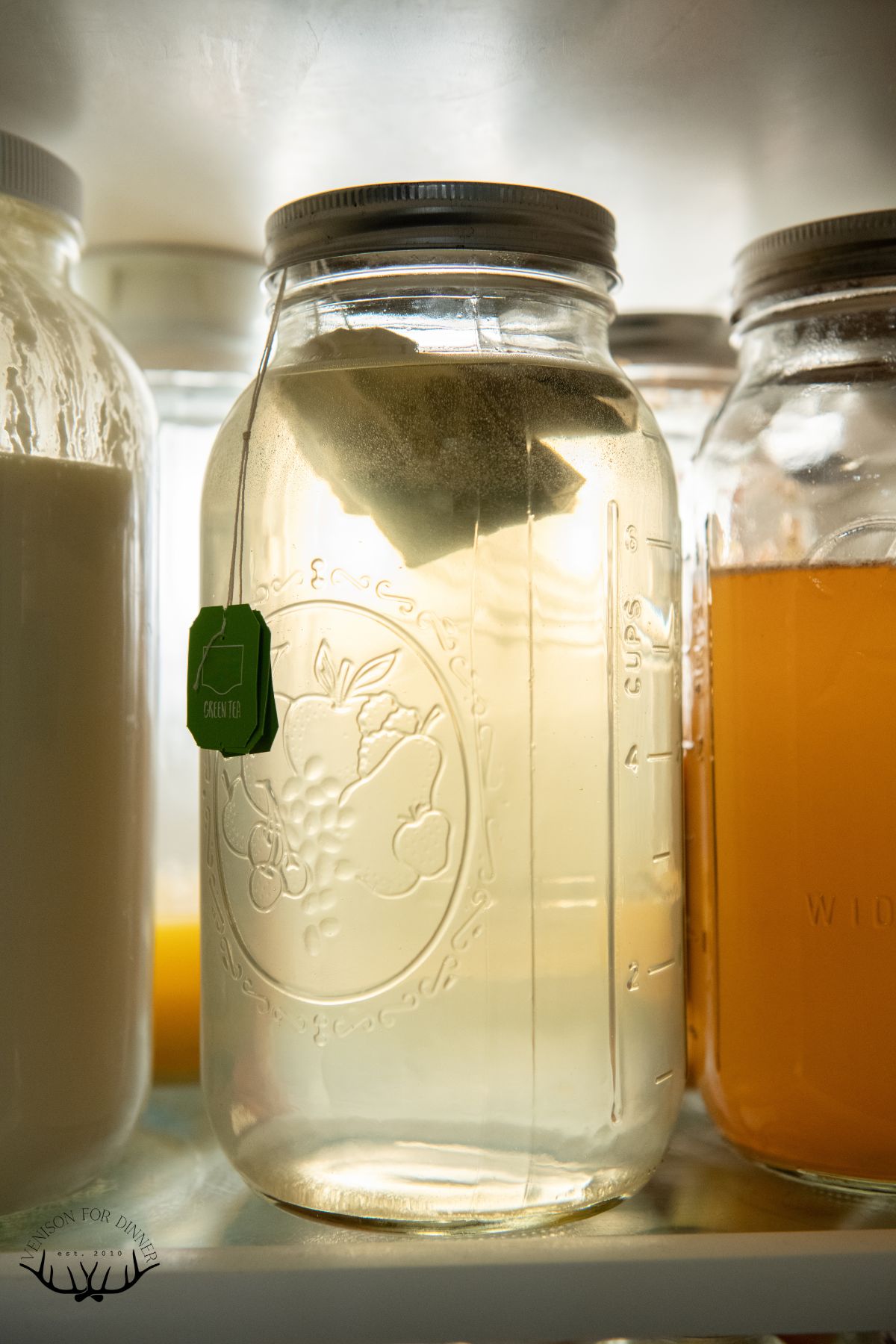 Jars of tea in the fridge.