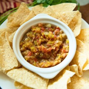 Chunky tomato salsa with tortilla chips.