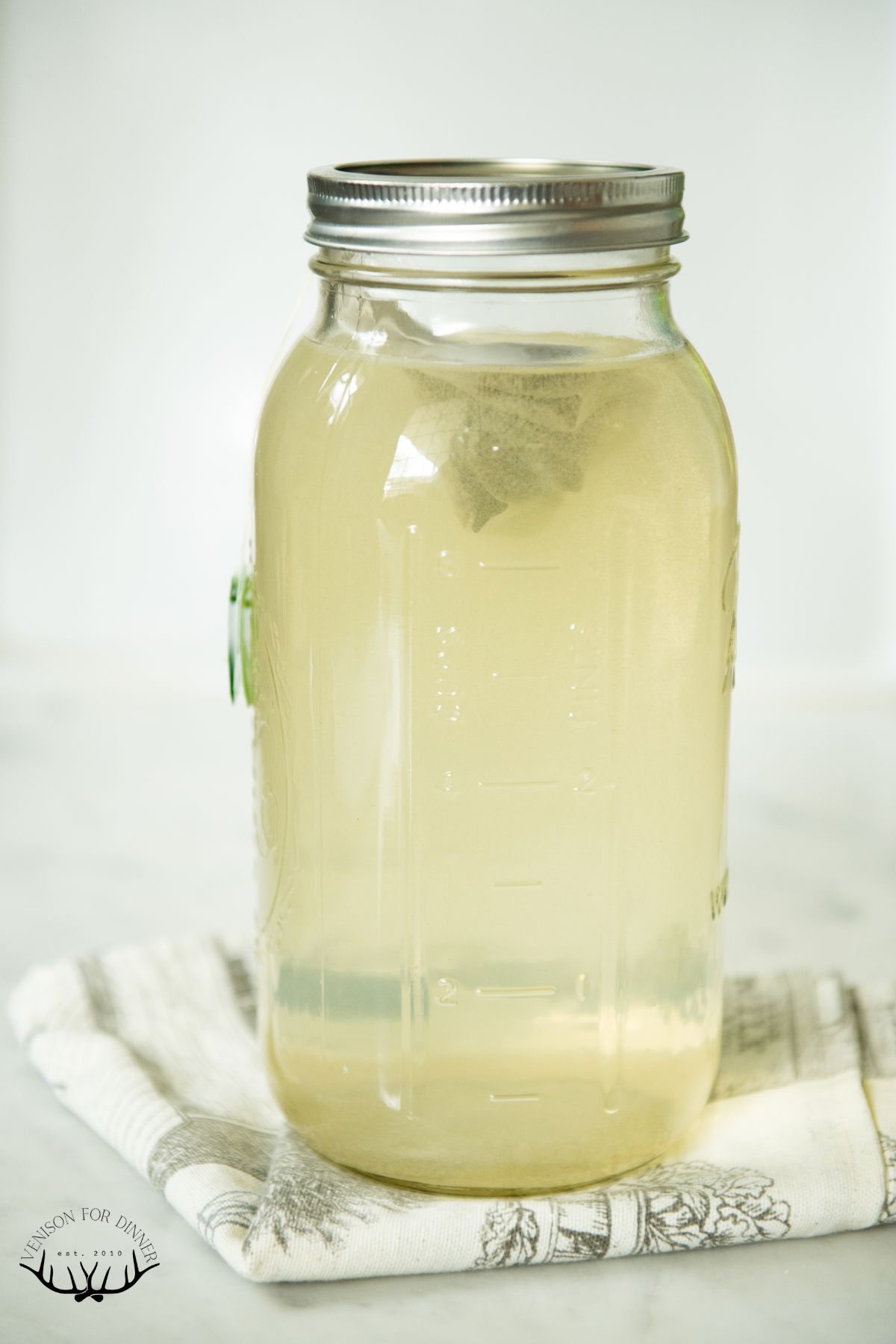 Green tea bags in a half gallon jar.
