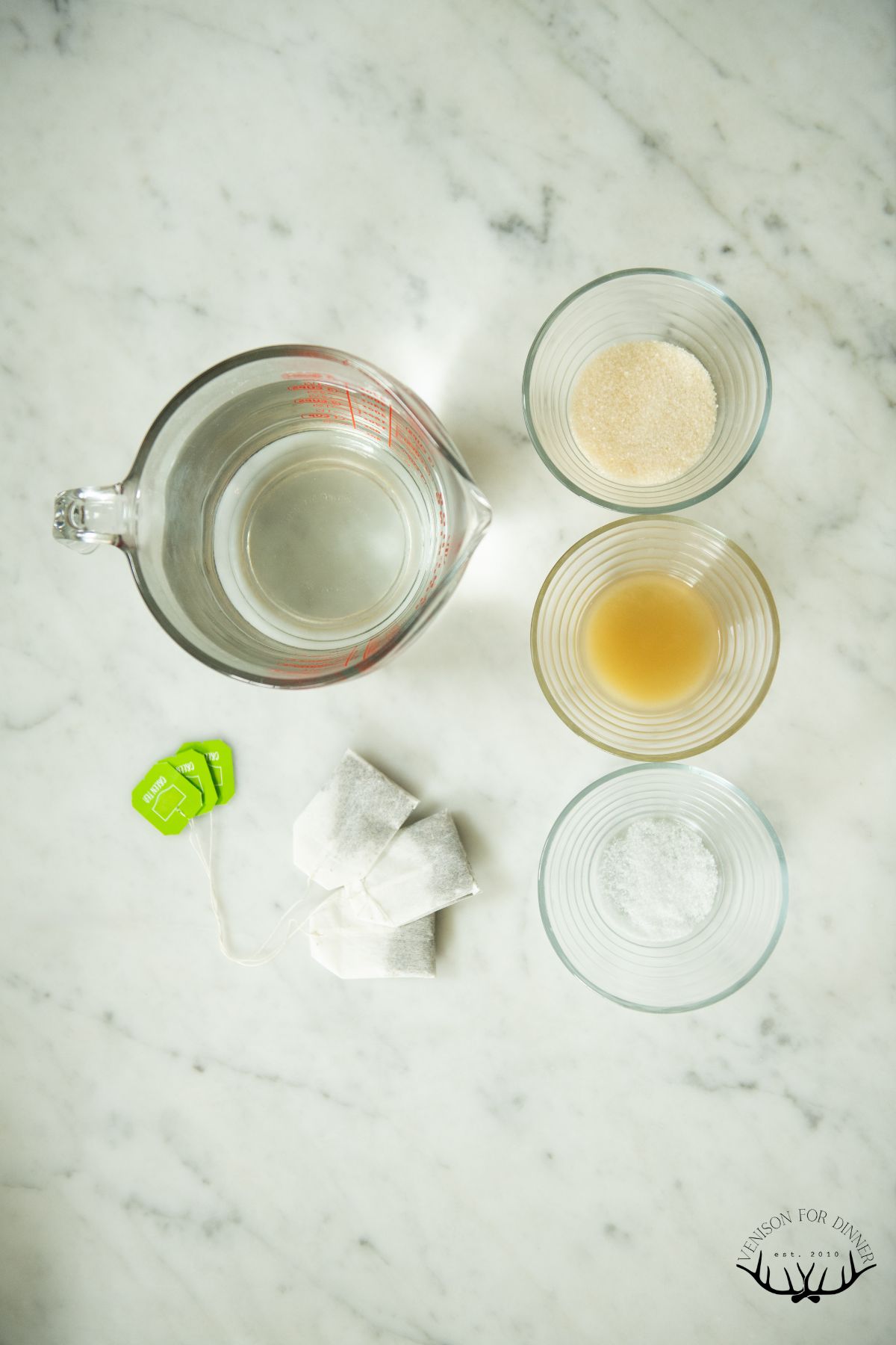 Ingredients to make honey sweetened green tea iced tea.