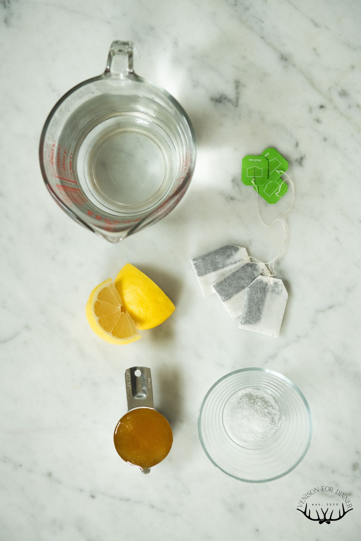 Ingredients to make honey-sweetened iced tea.