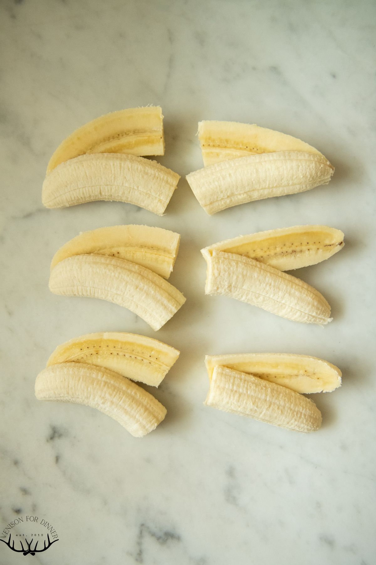 Bananas sliced in quarters.