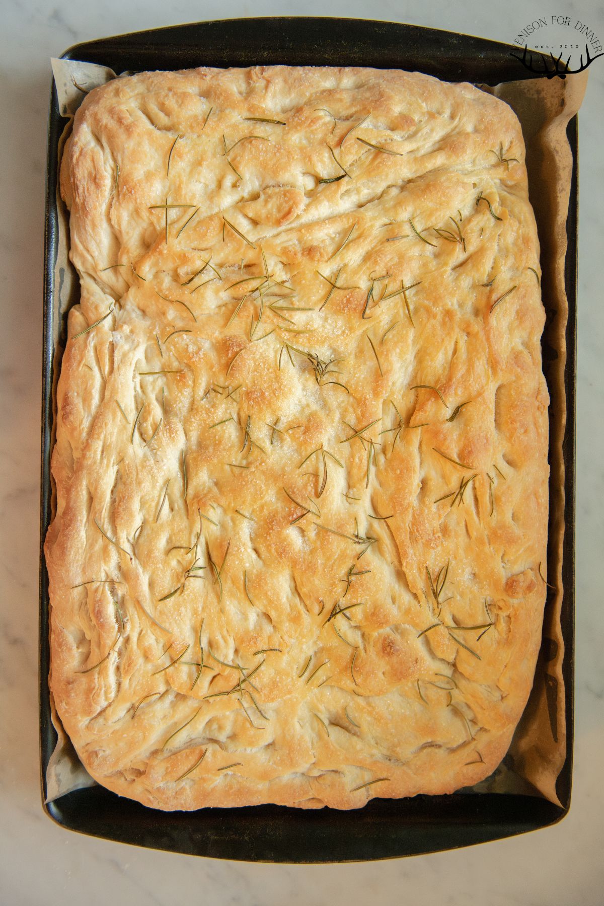 Baked Italian herbed focaccia bread.