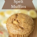 A banana spelt muffin in a liner.