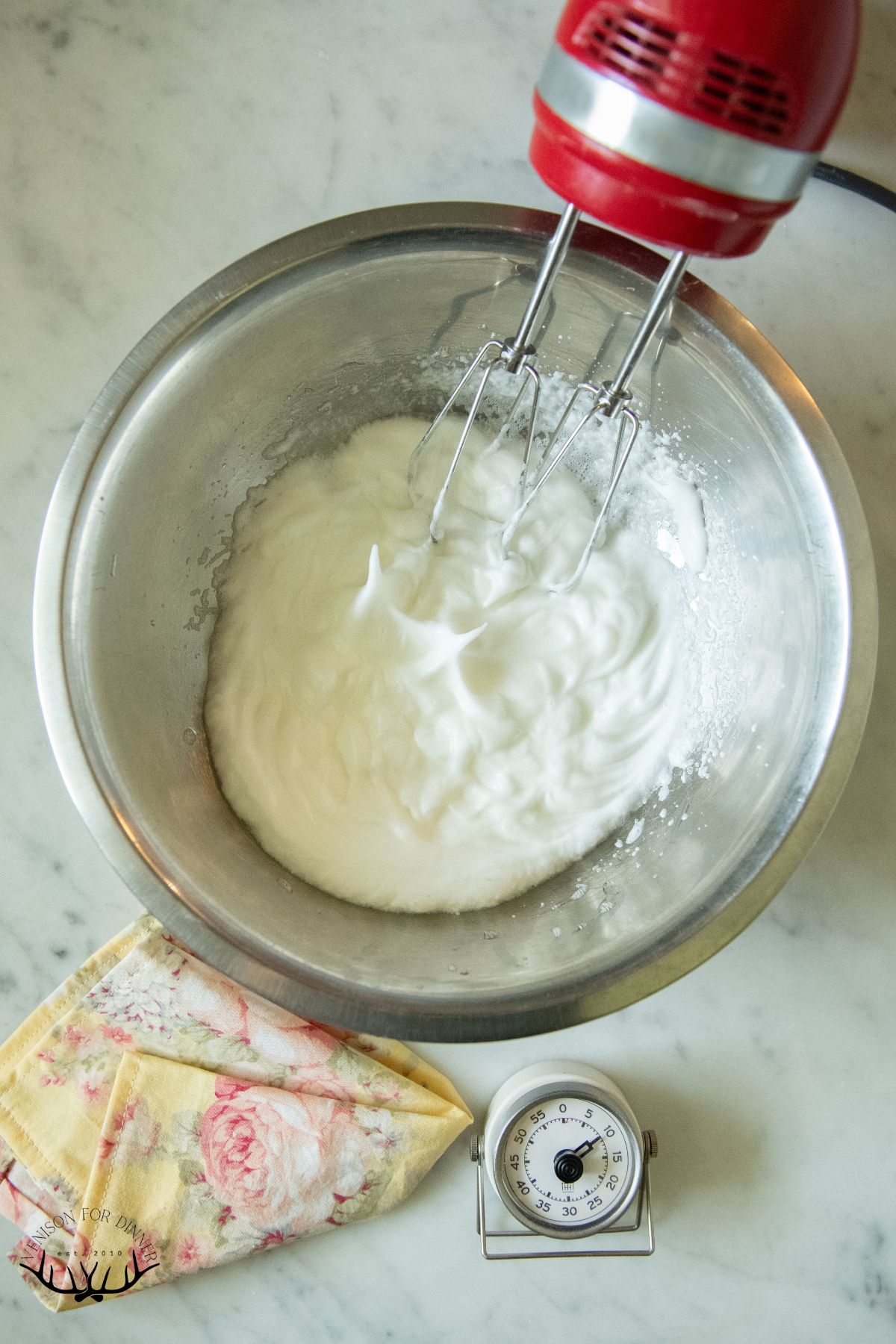 Whipping egg whites for banana muffins.