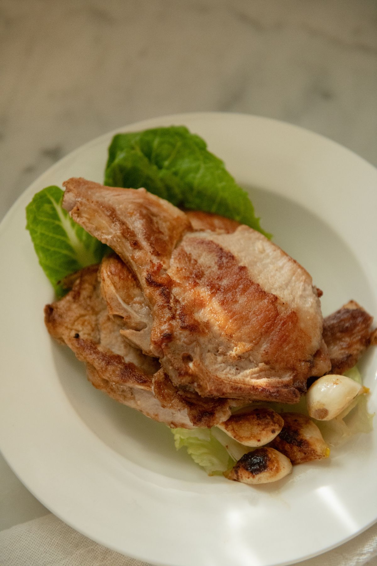 Bone-in pork chops brined and seared.
