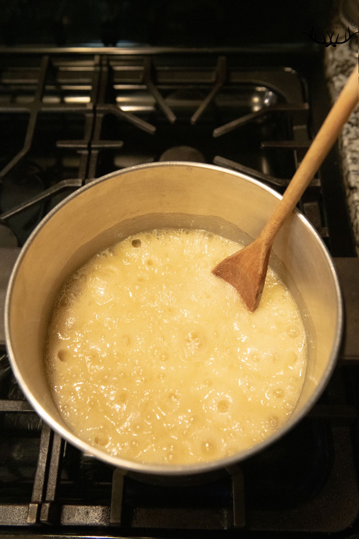 Butter and sugar boiling in a pot.