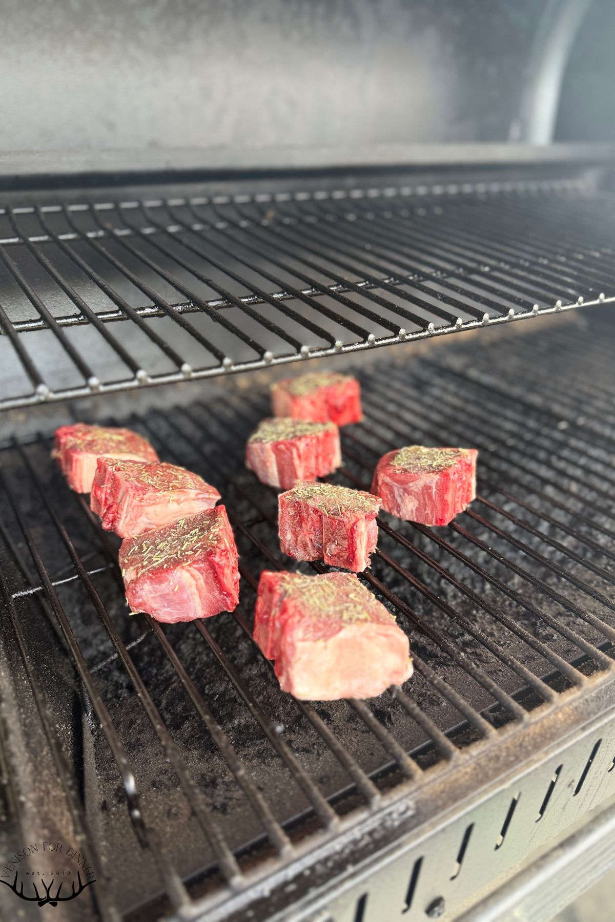 Rosemary lamb chops on a grill.