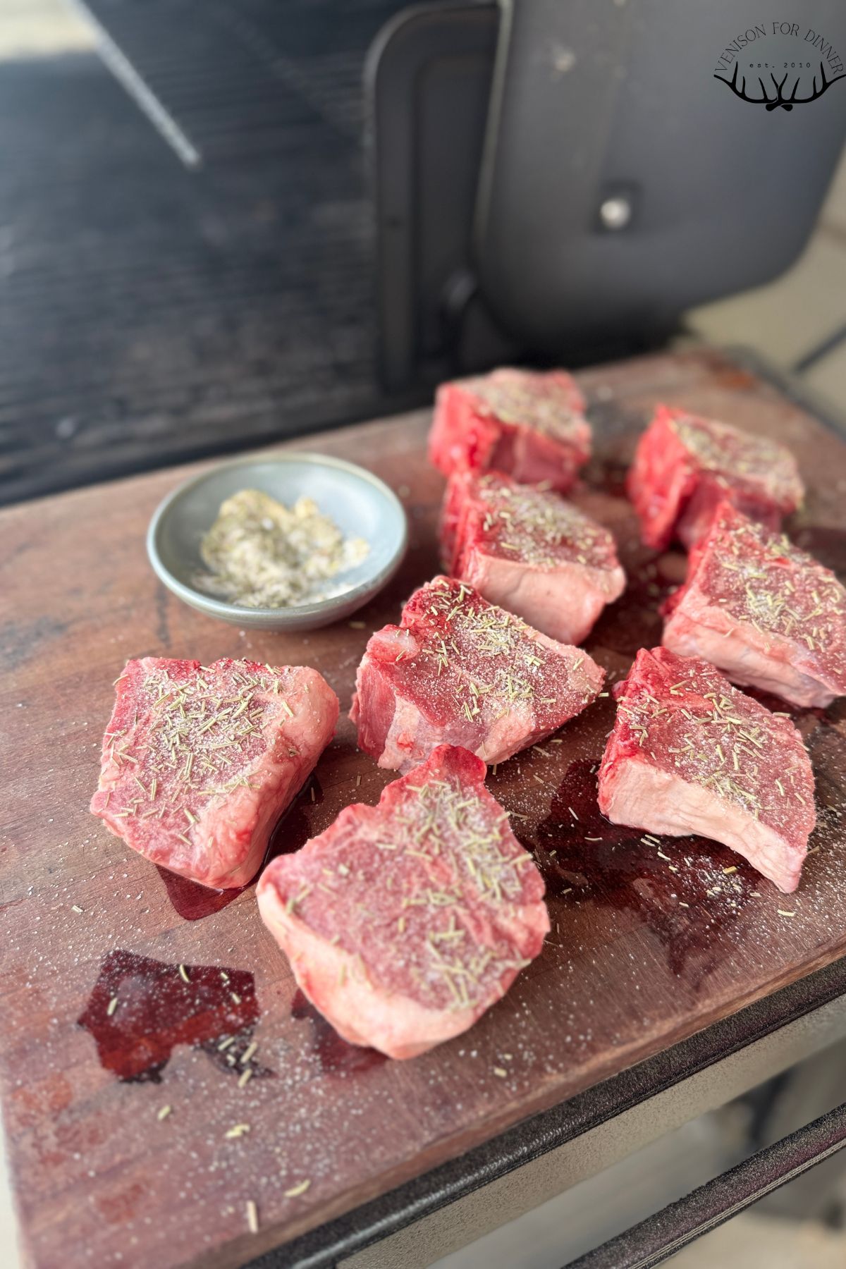 Seasoned lamb chops ready to grill.