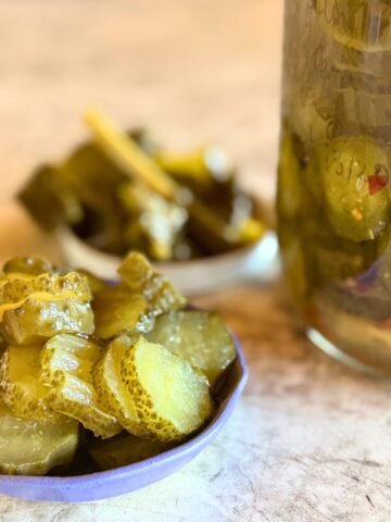 Probiotic pickle slices in a bowl.
