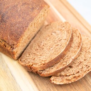 Slices of brown molasses bread.