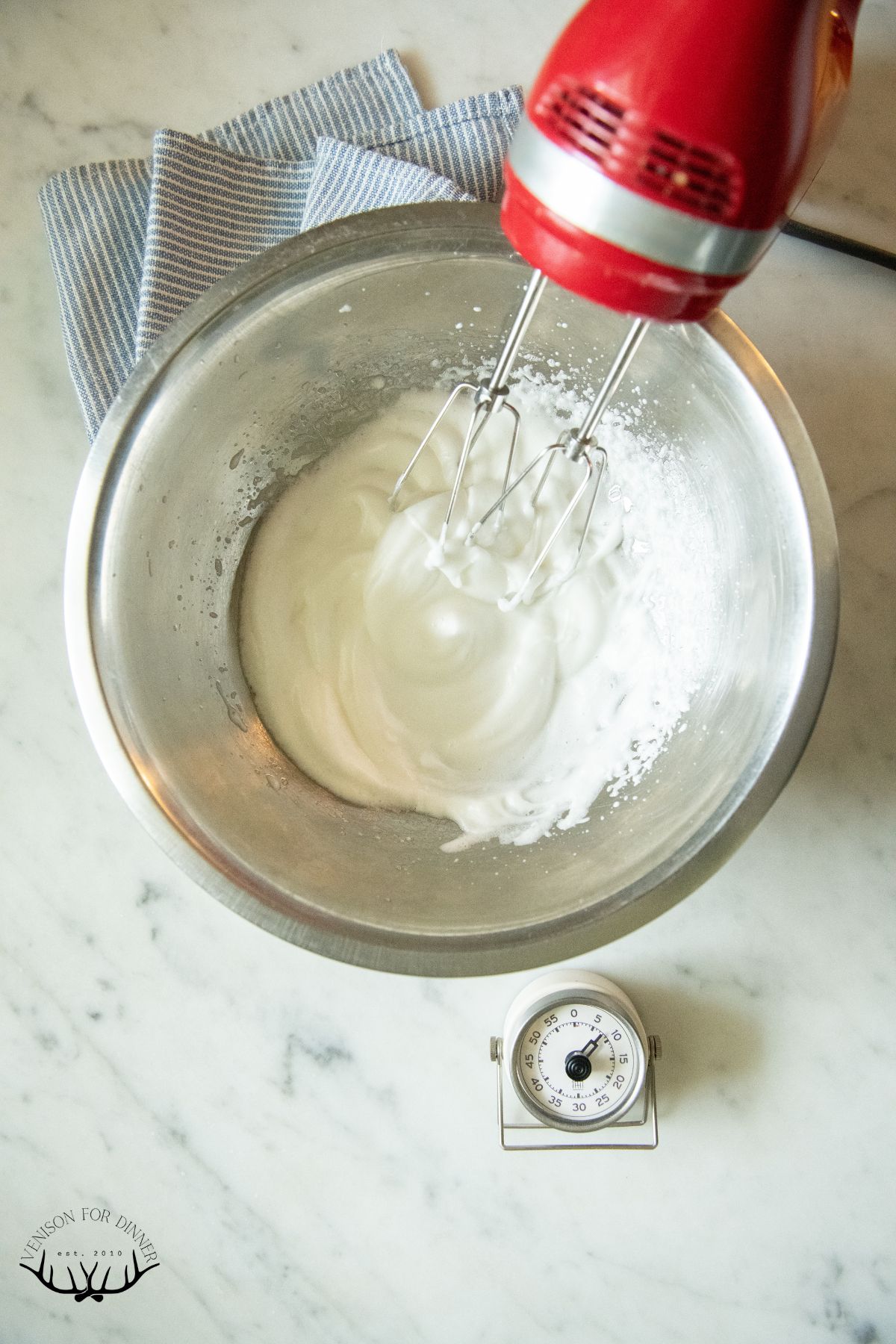 Whipping egg whites in a bowl.