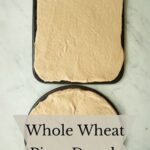 Two pans of whole wheat pizza dough ready to top.