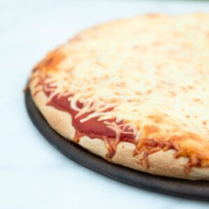 Cheese pizza with whole wheat crust.
