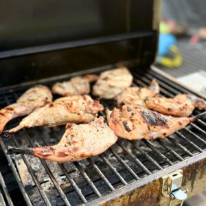 Rabbit legs on a grill.