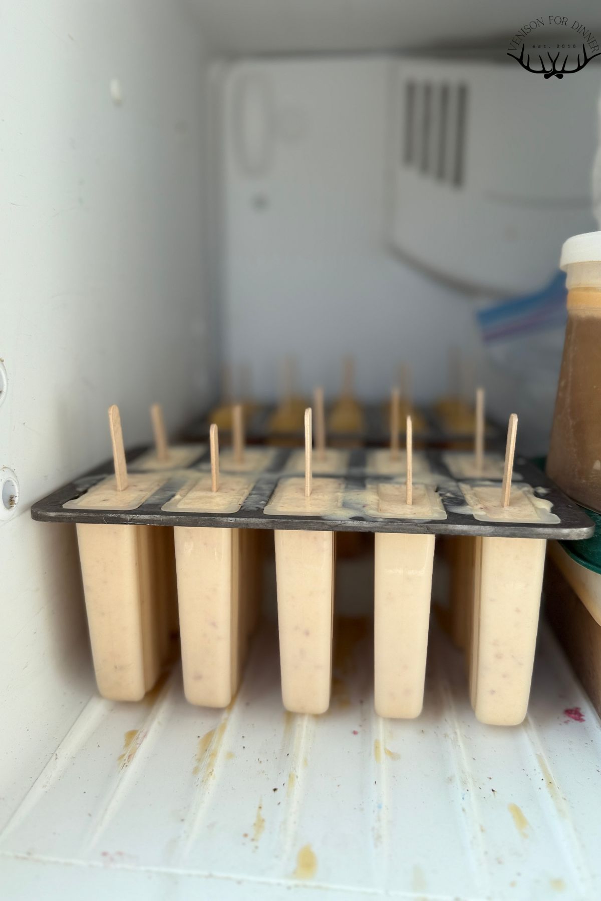 Peaches and cream pops in the freezer.
