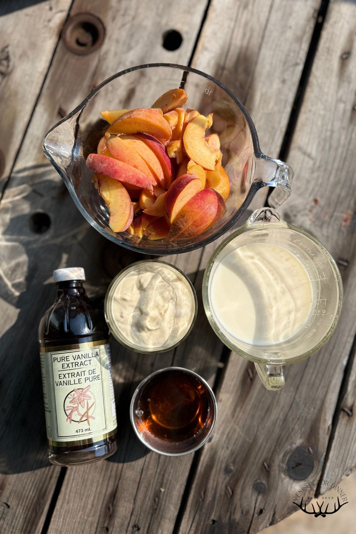 Ingredients to make peach popsicles.