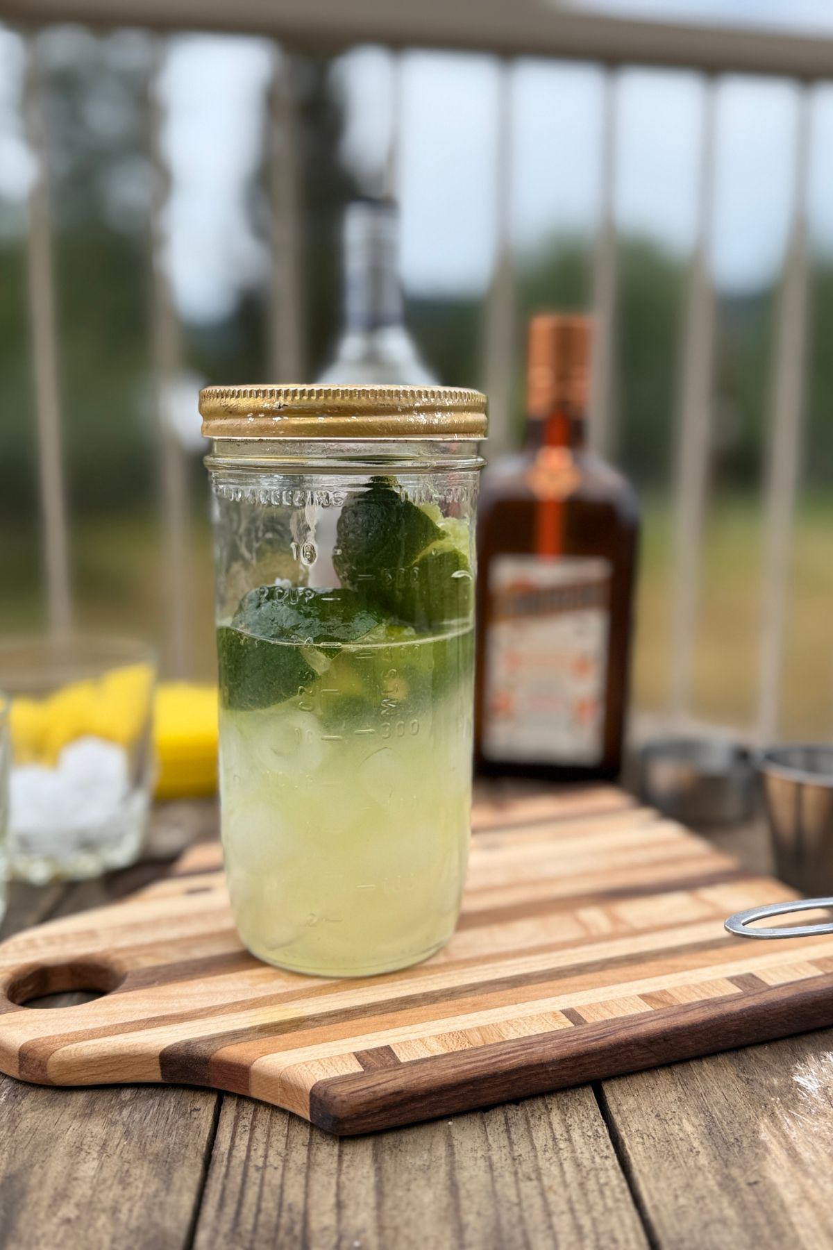 Margarita in a jar ready to shake.